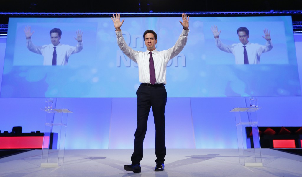 Ed Miliband, leader of Britain's opposition Labour Party, waves to delegates as he arrives for a question and answer session at the party's annual conference, in Manchester